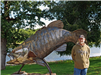  Parker McDonald standing with his Bass Sculpture